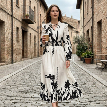 👗 50 % DE RÉDUCTION EN CE MOMENT ! 🌸 Robe longue à motifs floraux, encolure en V et manches à volants – silhouette flatteuse, légère et parfaite pour faire la fête 🥂
