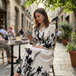 👗 50 % DE RÉDUCTION EN CE MOMENT ! 🌸 Robe longue à motifs floraux, encolure en V et manches à volants – silhouette flatteuse, légère et parfaite pour faire la fête 🥂